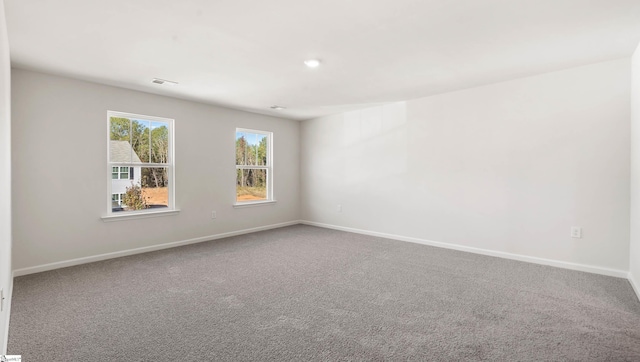 spare room with carpet flooring