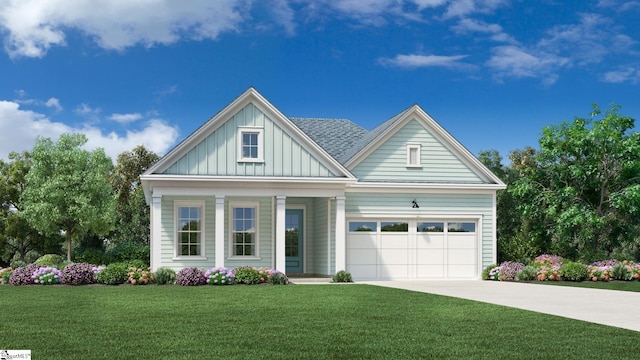 view of front of house with a garage and a front lawn