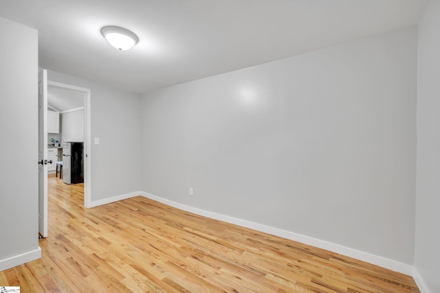 empty room with light wood-type flooring