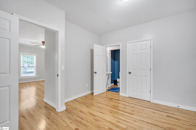 interior space with ceiling fan and light hardwood / wood-style flooring