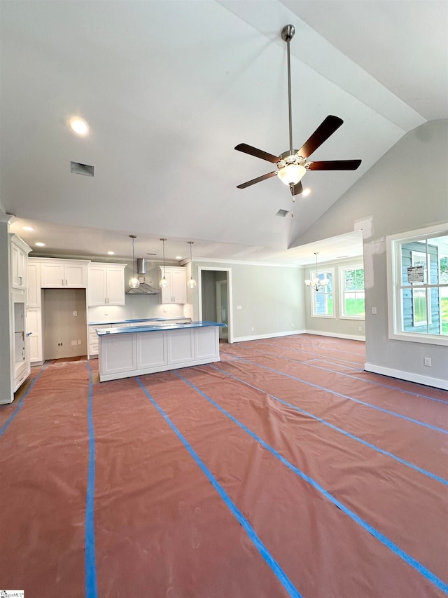 unfurnished living room with baseboards, lofted ceiling, visible vents, and a ceiling fan