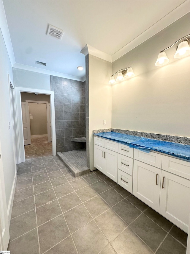 full bathroom with visible vents, ornamental molding, tile patterned flooring, and a walk in shower