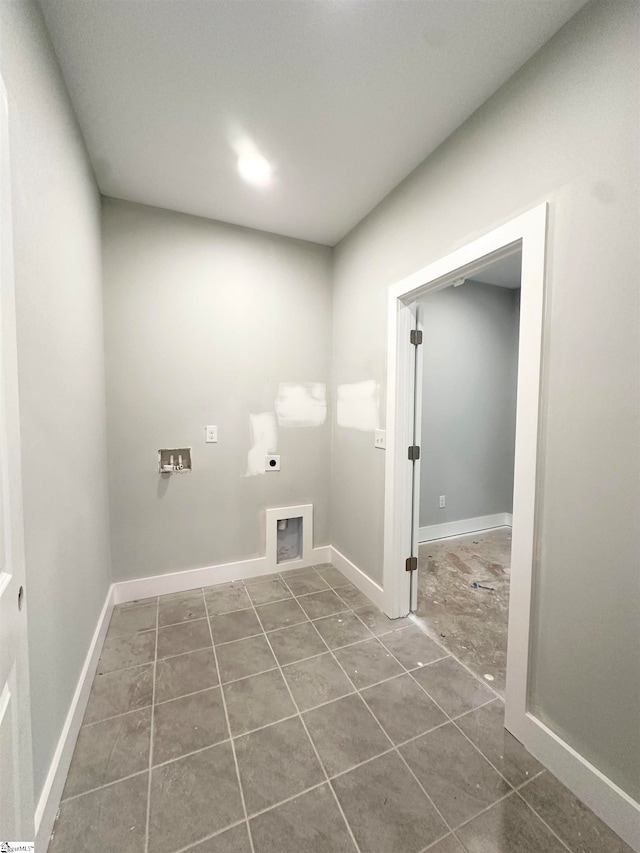 laundry area featuring hookup for a washing machine, laundry area, baseboards, and electric dryer hookup