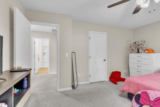 bedroom featuring ceiling fan and light colored carpet