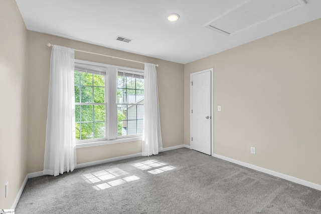 unfurnished room featuring carpet flooring