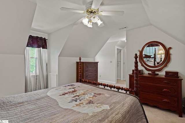 bedroom with lofted ceiling, carpet flooring, and ceiling fan