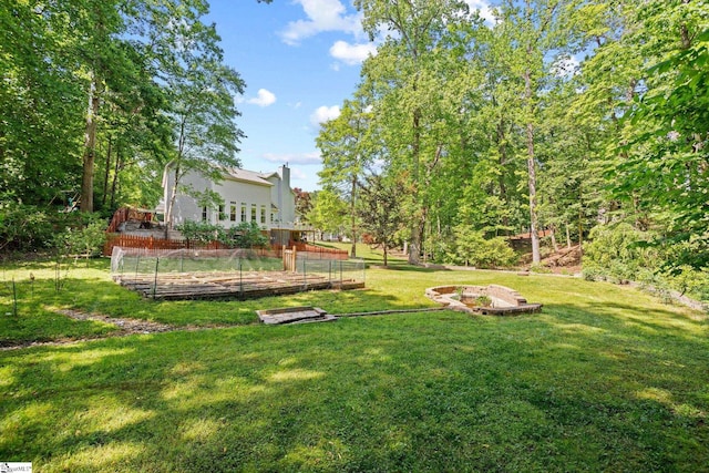 view of yard featuring a wooden deck