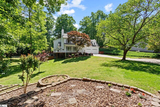 view of yard featuring a garage