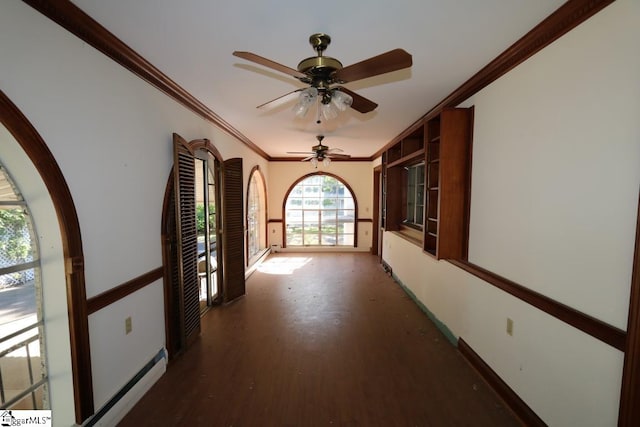 hallway with wood-type flooring, ornamental molding, and a baseboard heating unit