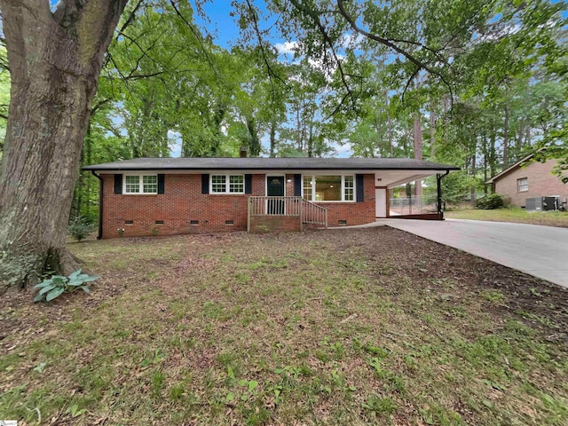 single story home featuring a carport