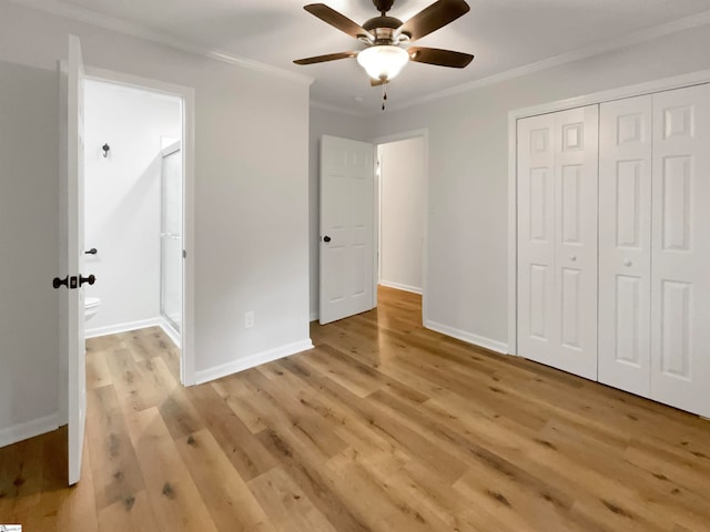 unfurnished bedroom featuring ceiling fan, light hardwood / wood-style floors, and ornamental molding