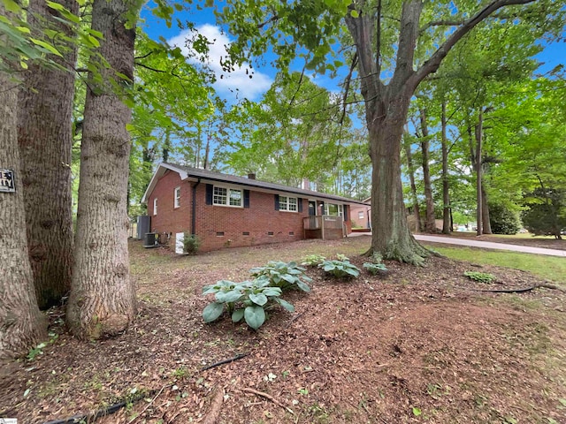 view of home's exterior featuring central AC unit