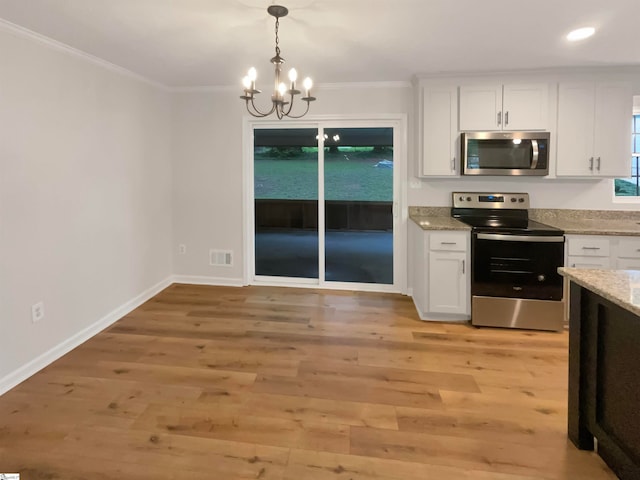 kitchen featuring light hardwood / wood-style floors, white cabinets, and appliances with stainless steel finishes