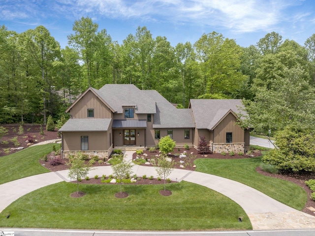 craftsman-style house with a front yard