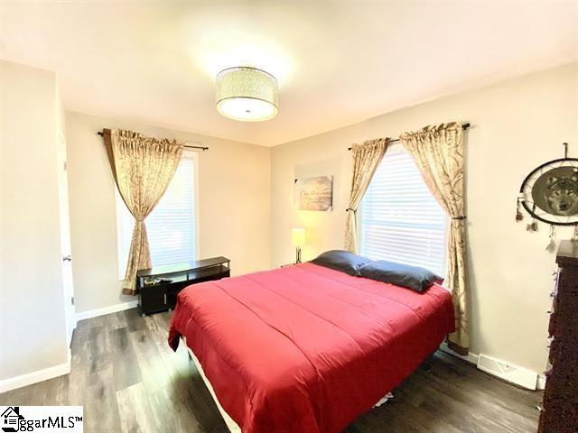 bedroom featuring dark hardwood / wood-style floors