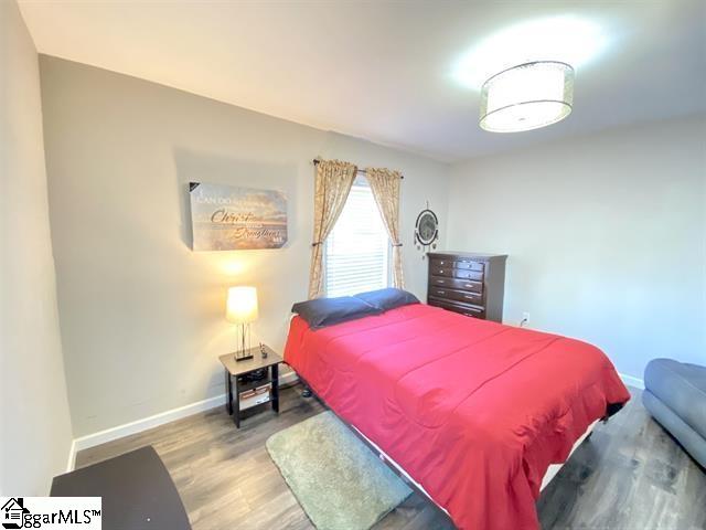 bedroom featuring hardwood / wood-style flooring