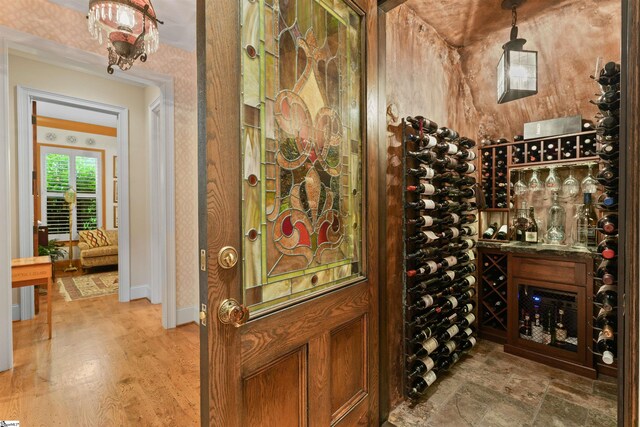 wine room featuring hardwood / wood-style flooring