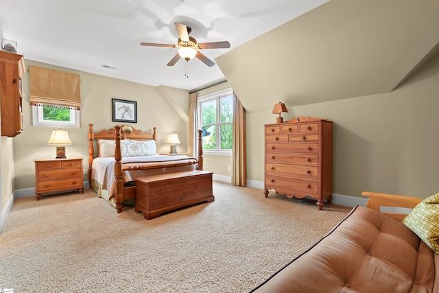 carpeted bedroom featuring ceiling fan and lofted ceiling