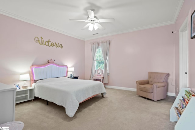 carpeted bedroom featuring crown molding, baseboards, and ceiling fan