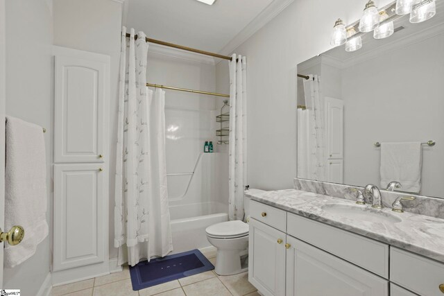 bathroom with ornamental molding, toilet, and tile patterned floors