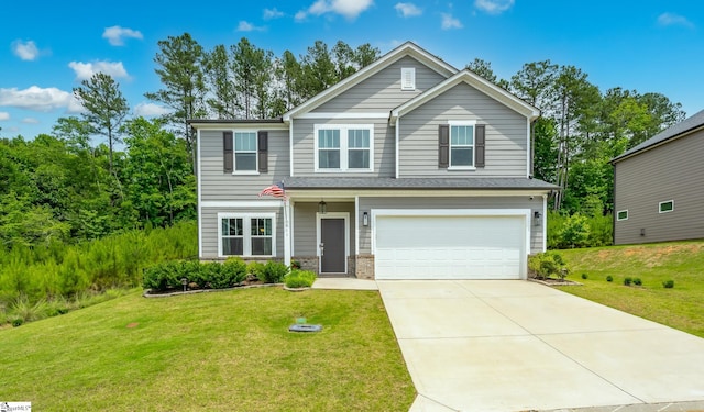 view of front facade featuring a garage and a front lawn