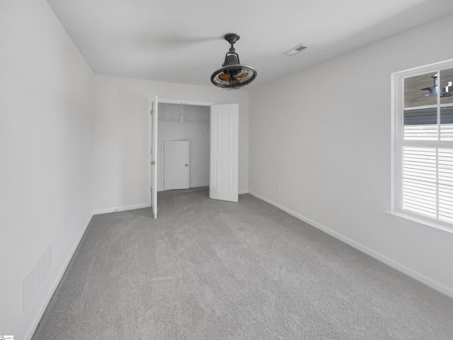 unfurnished bedroom with carpet flooring