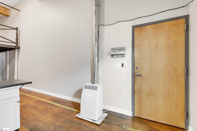 interior space featuring dark hardwood / wood-style floors