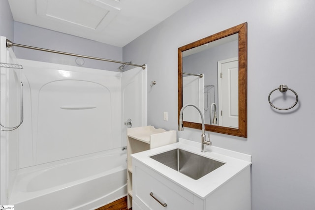 bathroom with shower / bathing tub combination and vanity