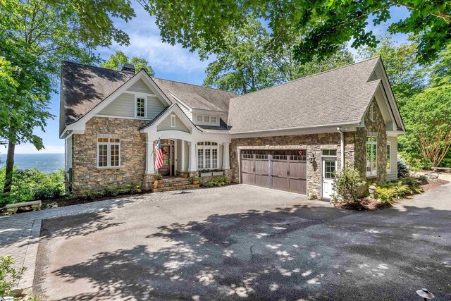 craftsman inspired home featuring a garage