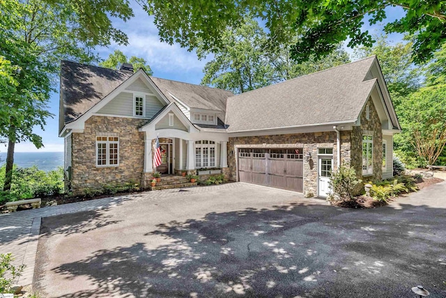7 Drift Away Ln, Landrum, SC 29356 - craftsman inspired home with stone siding, a garage, aphalt driveway, and roof with shingles