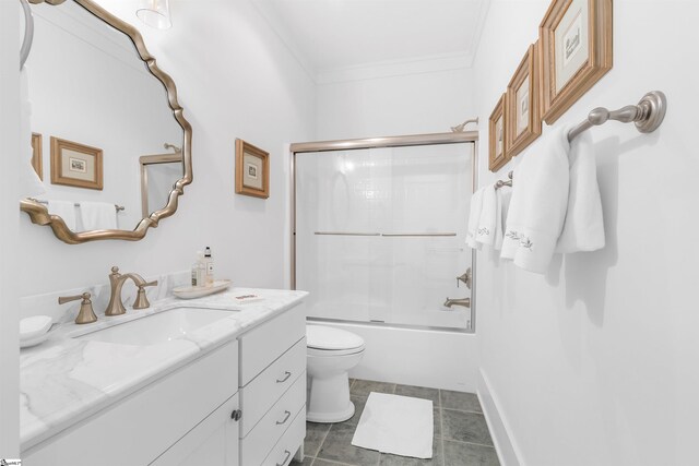 full bathroom with enclosed tub / shower combo, tile floors, ornamental molding, toilet, and large vanity