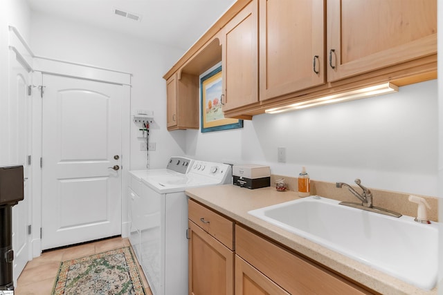 7 Drift Away Ln, Landrum, SC 29356 - laundry area featuring a sink, separate washer and dryer, light tile patterned floors, visible vents, and cabinet space