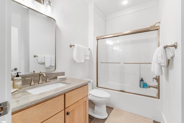 7 Drift Away Ln, Landrum, SC 29356 - bathroom with tile patterned floors, toilet, vanity, ornamental molding, and shower / bath combination with glass door