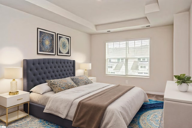 bedroom with hardwood / wood-style floors