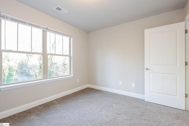 view of carpeted spare room