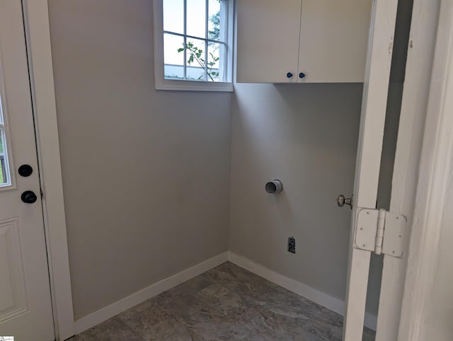 washroom featuring cabinets