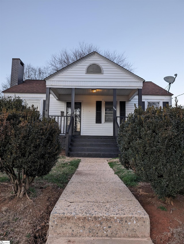 bungalow-style house featuring covered porch