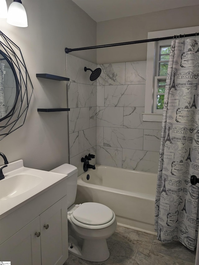 full bathroom with shower / tub combo with curtain, vanity, and toilet