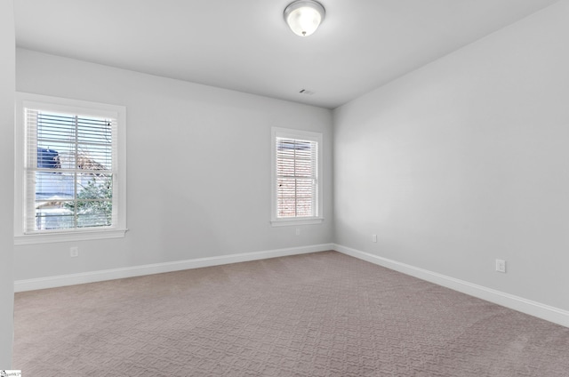 empty room with carpet floors