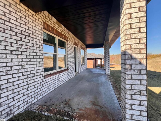 view of home's exterior featuring brick siding