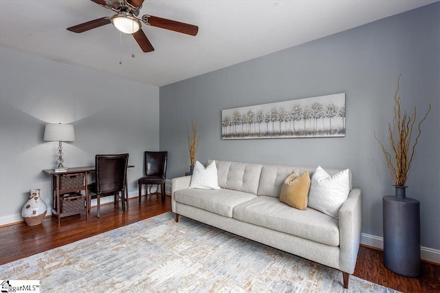 living room with hardwood / wood-style flooring and ceiling fan