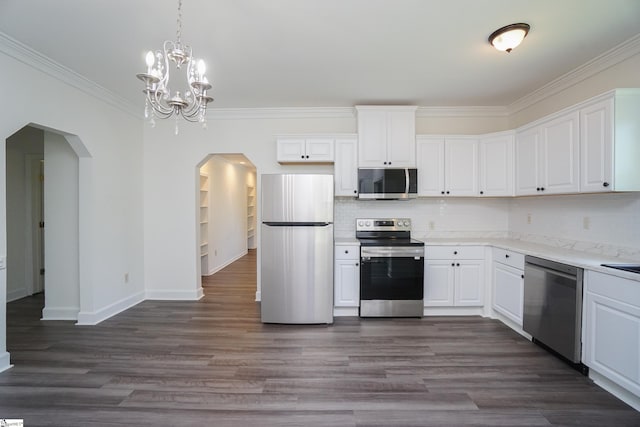 kitchen featuring white cabinets, stainless steel appliances, and dark wood-type flooring