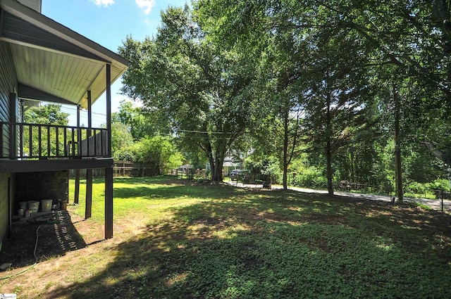 view of yard with a deck