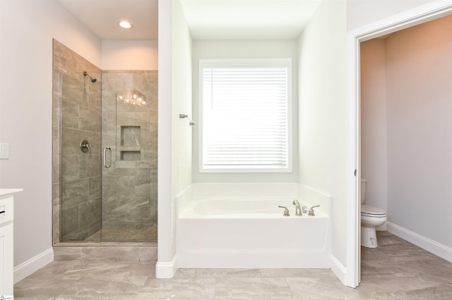 full bathroom with tile flooring, independent shower and bath, vanity, and toilet