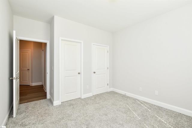 unfurnished bedroom featuring carpet floors