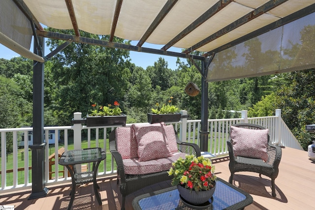 wooden deck with a lawn, an outdoor living space, and a pergola