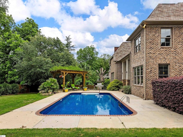 view of swimming pool with a patio area and a pergola