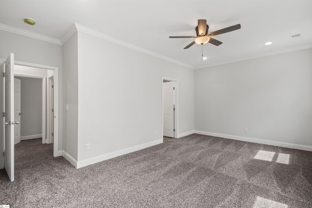 carpeted empty room featuring ceiling fan and crown molding