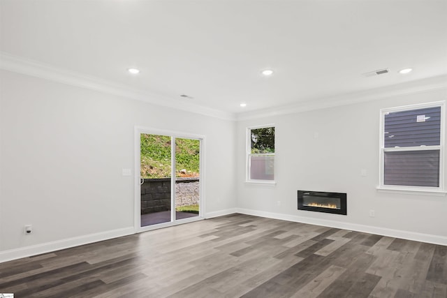 interior space with crown molding and dark hardwood / wood-style floors