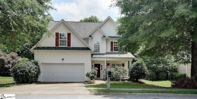 view of front of property featuring a garage